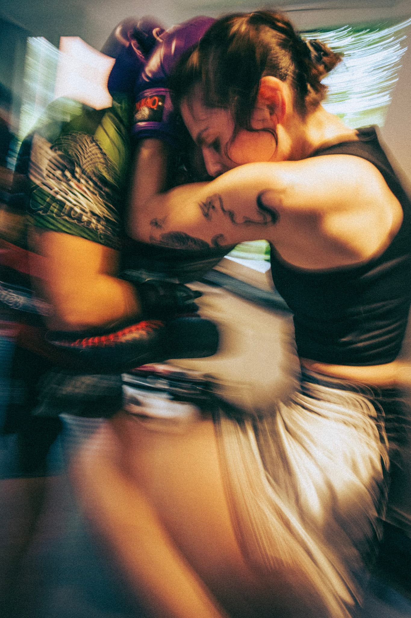 Girl in Muay Thai Training, clinching.